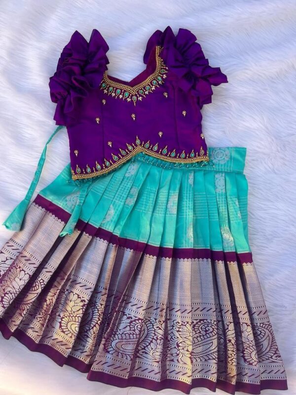 Purple & Aqua Blue Designer Pattu Pavadai for Girls – With Frill Sleeves & Mirror Work